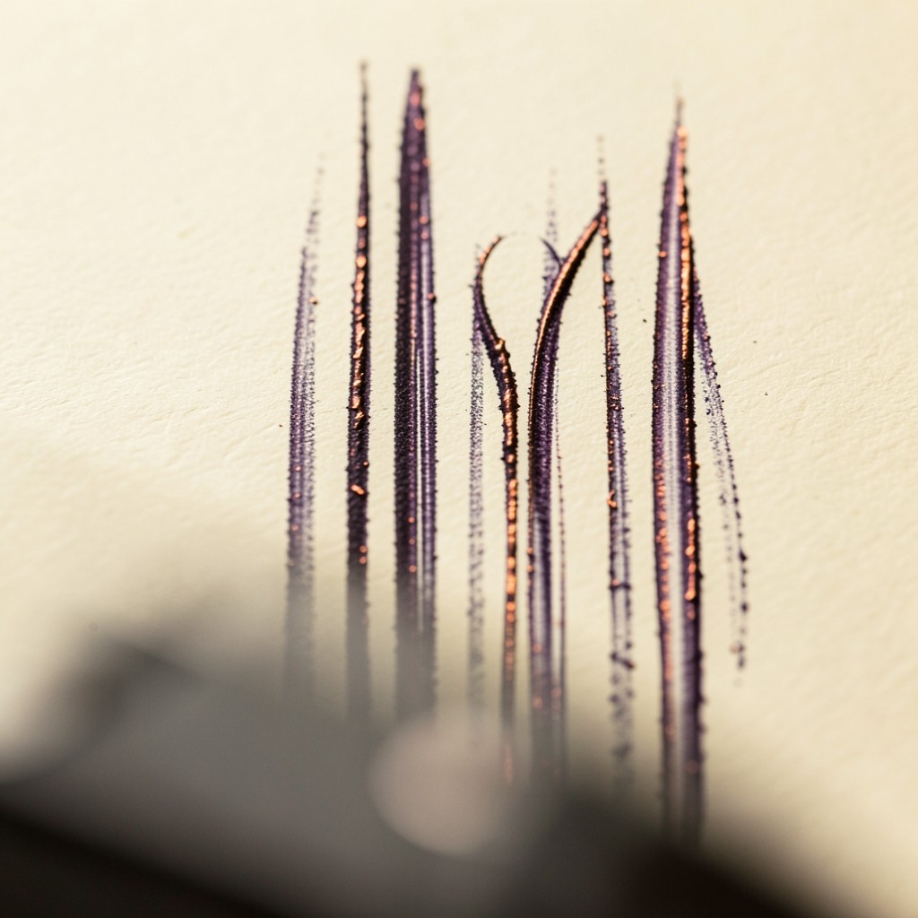 Vertical graphite strokes of uneven height on ivory paper, the tallest stroke beside a curve that barely moves